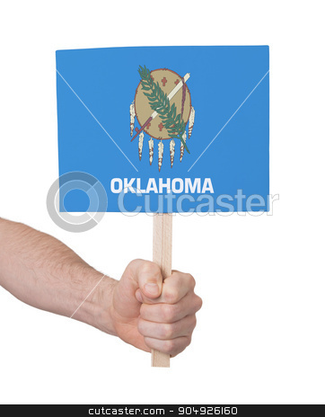 To use this stock image in your creative project, please select the size you need over to the right and click the "Add to Cart" button.
Your downloaded image will come with the Cutcaster watermark removed so don’t worry about the watermark you see on this page. Hand holding small card - Flag of Oklahoma stock photo, Hand holding small card, isolated on white - Flag of Oklahoma by michaklootwijk