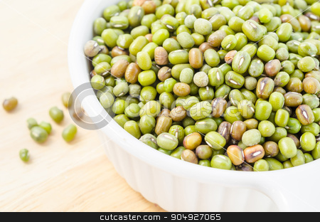 To use this stock image in your creative project, please select the size you need over to the right and click the "Add to Cart" button.
Your downloaded image will come with the Cutcaster watermark removed so don’t worry about the watermark you see on this page. Healthy vegetarian super foods ingredient mung beans. stock photo, Healthy vegetarian super foods ingredient mung beans in cup on wooden background. by Miss. PENCHAN PUMILA