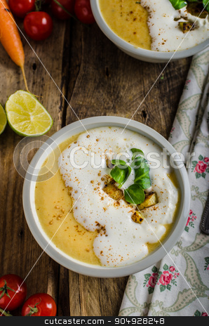 To use this stock image in your creative project, please select the size you need over to the right and click the "Add to Cart" button.
Your downloaded image will come with the Cutcaster watermark removed so don’t worry about the watermark you see on this page. Creamy celery soup stock photo, Celery soup with homemade whipped cream, baked potatoes and homemade bread by Peteer