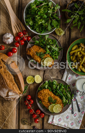 To use this stock image in your creative project, please select the size you need over to the right and click the "Add to Cart" button.
Your downloaded image will come with the Cutcaster watermark removed so don’t worry about the watermark you see on this page. True Viennese schnitzel stock photo, True Viennese schnitzel with little salad and lime, french fries and beautiful cherry tomatoes by Peteer