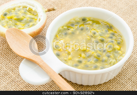 To use this stock image in your creative project, please select the size you need over to the right and click the "Add to Cart" button.
Your downloaded image will come with the Cutcaster watermark removed so don’t worry about the watermark you see on this page. Passion fruit juice in white cup with wooden spoon. stock photo, Passion fruit juice in white cup with wooden spoon on sack background. by Miss. PENCHAN PUMILA