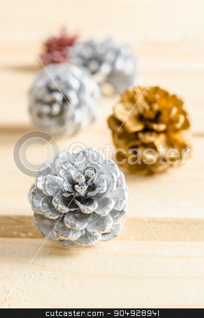 To use this stock image in your creative project, please select the size you need over to the right and click the "Add to Cart" button.
Your downloaded image will come with the Cutcaster watermark removed so don’t worry about the watermark you see on this page. Christmas, decoration with pine cones silver. stock photo, Close up christmas, decoration with pine cones silver. by Miss. PENCHAN PUMILA