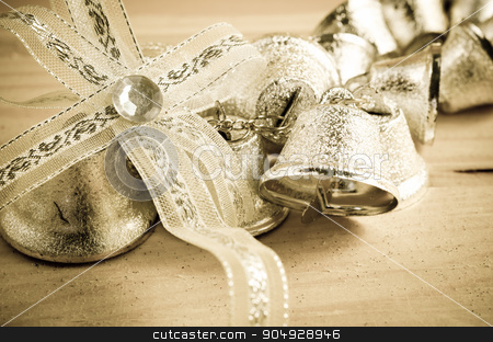 To use this stock image in your creative project, please select the size you need over to the right and click the "Add to Cart" button.
Your downloaded image will come with the Cutcaster watermark removed so don’t worry about the watermark you see on this page. Christmas decoration. Silver bell. stock photo, Christmas decoration. Silver bell in vintage background. by Miss. PENCHAN PUMILA
