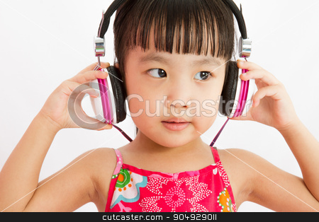 To use this stock image in your creative project, please select the size you need over to the right and click the "Add to Cart" button.
Your downloaded image will come with the Cutcaster watermark removed so don’t worry about the watermark you see on this page. Chinese little girl on headphones stock photo, Chinese little girl on headphones smile with plain white isolated background. by Tan Kian Khoon