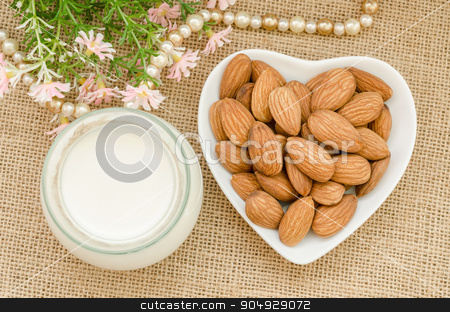 To use this stock image in your creative project, please select the size you need over to the right and click the "Add to Cart" button.
Your downloaded image will come with the Cutcaster watermark removed so don’t worry about the watermark you see on this page. Almond milk with almond on a white bowl cup. stock photo, Almond milk with almond on a white bowl cup with flower on sack background. by Miss. PENCHAN PUMILA