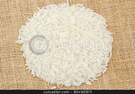 To use this stock image in your creative project, please select the size you need over to the right and click the "Add to Cart" button.
Your downloaded image will come with the Cutcaster watermark removed so don’t worry about the watermark you see on this page. Heap of raw white rice. stock photo, Heap of raw white rice on sack background. by Miss. PENCHAN PUMILA