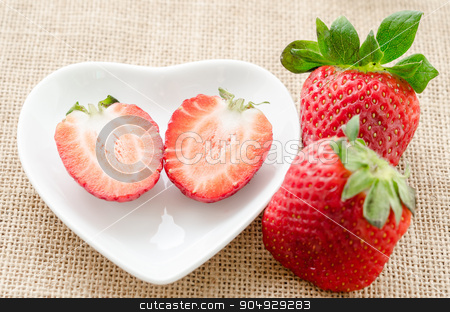 To use this stock image in your creative project, please select the size you need over to the right and click the "Add to Cart" button.
Your downloaded image will come with the Cutcaster watermark removed so don’t worry about the watermark you see on this page. Ripe sweet strawberries. stock photo, Ripe sweet strawberries in white bowl on sack background. by Miss. PENCHAN PUMILA