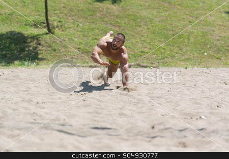 To use this stock image in your creative project, please select the size you need over to the right and click the "Add to Cart" button.
Your downloaded image will come with the Cutcaster watermark removed so don’t worry about the watermark you see on this page. Male Beach Volleyball Game Player Jump On Sand stock photo, Muscular Young Man Playing Beach Volleyball Diving After The Ball by Jasminko Ibrakovic