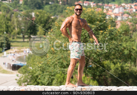 To use this stock image in your creative project, please select the size you need over to the right and click the "Add to Cart" button.
Your downloaded image will come with the Cutcaster watermark removed so don’t worry about the watermark you see on this page. Man Flexing Muscles Outdoors In Summer Time stock photo, Portrait Of A Physically Fit Man Showing His Well Trained Body Outdoors In Summer Time by Jasminko Ibrakovic