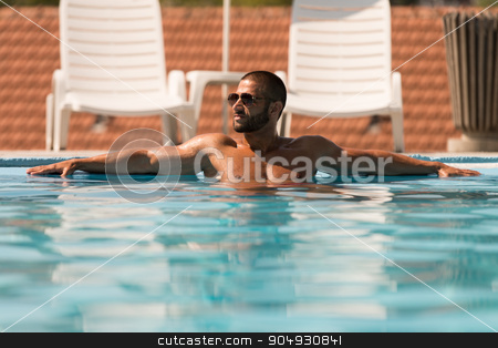 To use this stock image in your creative project, please select the size you need over to the right and click the "Add to Cart" button.
Your downloaded image will come with the Cutcaster watermark removed so don’t worry about the watermark you see on this page. Man Resting Relaxed On Edge Of Swimming Pool stock photo, Fashion Portrait Of A Very Muscular Sexy Man In Underwear At Swimming Pool by Jasminko Ibrakovic