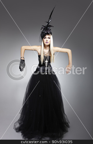 To use this stock image in your creative project, please select the size you need over to the right and click the "Add to Cart" button.
Your downloaded image will come with the Cutcaster watermark removed so don’t worry about the watermark you see on this page. Model wearing a bohemian dress stock photo, Beautiful blonde model wearing a bohemian dress, a hat with veil and feathers and a satin glove that finishes the look by JRstock