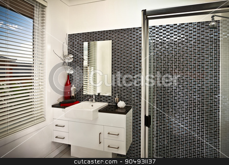 To use this stock image in your creative project, please select the size you need over to the right and click the "Add to Cart" button.
Your downloaded image will come with the Cutcaster watermark removed so don’t worry about the watermark you see on this page. A beautiful modern stylish bathroom stock photo, A beautiful modern stylish bathroom witha window and shower on right side by JRstock