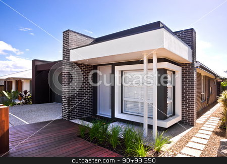 To use this stock image in your creative project, please select the size you need over to the right and click the "Add to Cart" button.
Your downloaded image will come with the Cutcaster watermark removed so don’t worry about the watermark you see on this page. A beautiful outside view of house with wooden floor and garden stock photo, A beautiful house view with wooden floor and garden around it and a garage on left side with windows on front of house. by JRstock