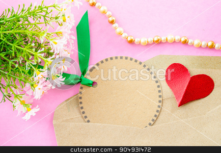 To use this stock image in your creative project, please select the size you need over to the right and click the "Add to Cart" button.
Your downloaded image will come with the Cutcaster watermark removed so don’t worry about the watermark you see on this page. Blank brown paper tag and red heart paper with flower. stock photo, Blank brown paper tag and red heart paper with flower on pink background. by Miss. PENCHAN PUMILA