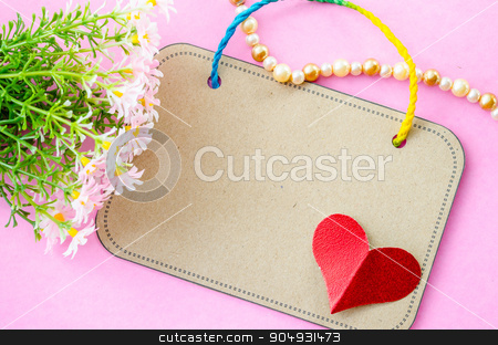 To use this stock image in your creative project, please select the size you need over to the right and click the "Add to Cart" button.
Your downloaded image will come with the Cutcaster watermark removed so don’t worry about the watermark you see on this page. Blank brown paper tag and red heart paper with flower. stock photo, Blank brown paper tag and red heart paper with flower on pink background. by Miss. PENCHAN PUMILA