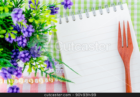 To use this stock image in your creative project, please select the size you need over to the right and click the "Add to Cart" button.
Your downloaded image will come with the Cutcaster watermark removed so don’t worry about the watermark you see on this page. Menu concept. stock photo, Open diary and wooden spoon fork with flower on beautiful fabric background. Menu concept. by Miss. PENCHAN PUMILA