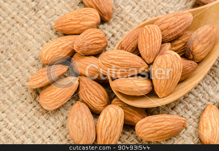 To use this stock image in your creative project, please select the size you need over to the right and click the "Add to Cart" button.
Your downloaded image will come with the Cutcaster watermark removed so don’t worry about the watermark you see on this page. Almonds. stock photo, Almonds in wooden spoon on sack background. by Miss. PENCHAN PUMILA