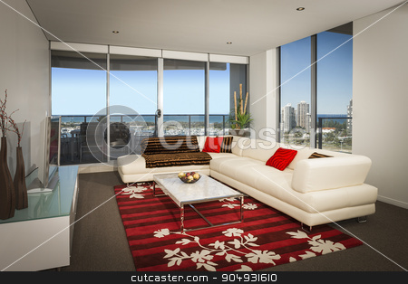 To use this stock image in your creative project, please select the size you need over to the right and click the "Add to Cart" button.
Your downloaded image will come with the Cutcaster watermark removed so don’t worry about the watermark you see on this page. White sofa in a spacious living room stock photo, Image of a white sofa in a spacious living room with big windows overlooking the city by JRstock