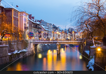 To use this stock image in your creative project, please select the size you need over to the right and click the "Add to Cart" button.
Your downloaded image will come with the Cutcaster watermark removed so don’t worry about the watermark you see on this page. Ljubljana in Christmas time. Slovenia, Europe. stock photo, View of lively river Ljubljanica bank with Cobblers' Bridge in old city center decorated with Christmas lights. Ljubljana, Slovenia, Europe. Shot at dusk. by kasto
