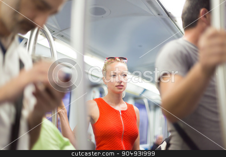 To use this stock image in your creative project, please select the size you need over to the right and click the "Add to Cart" button.
Your downloaded image will come with the Cutcaster watermark removed so don’t worry about the watermark you see on this page. Lady traveling by metro. stock photo, Beautiful blonde caucasian lady in red dress traveling by metro. by kasto