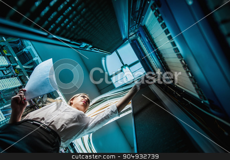 To use this stock image in your creative project, please select the size you need over to the right and click the "Add to Cart" button.
Your downloaded image will come with the Cutcaster watermark removed so don’t worry about the watermark you see on this page. Young engineer businesswoman in network server room stock photo, Young engineer businesswoman in network server room. Russia. by agnormark