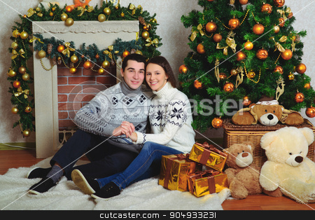 To use this stock image in your creative project, please select the size you need over to the right and click the "Add to Cart" button.
Your downloaded image will come with the Cutcaster watermark removed so don’t worry about the watermark you see on this page. Nice love couple sitting on carpet in front of fireplace stock photo, Nice love couple sitting on carpet in front of fireplace. Woman and man celebrating Christmas by zakharovaleksey