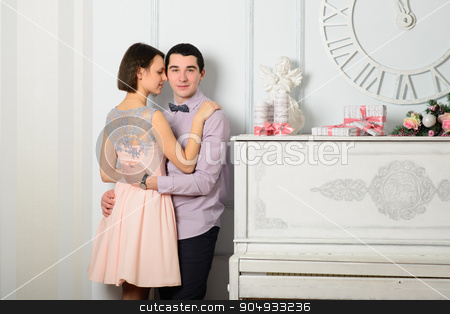 To use this stock image in your creative project, please select the size you need over to the right and click the "Add to Cart" button.
Your downloaded image will come with the Cutcaster watermark removed so don’t worry about the watermark you see on this page. Couple in love near the piano stock photo, Couple in love near the piano. New Year, Christmas, holiday. Romantic evening by zakharovaleksey