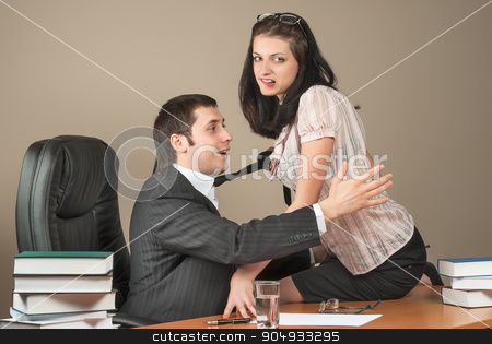 To use this stock image in your creative project, please select the size you need over to the right and click the "Add to Cart" button.
Your downloaded image will come with the Cutcaster watermark removed so don’t worry about the watermark you see on this page. Businesswoman is seducing her boss at office stock photo, Flirting in the office as a beautiful dark-haired businesswoman pulls a colleague towards her by his tie by Aikon