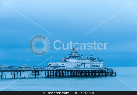 To use this stock image in your creative project, please select the size you need over to the right and click the "Add to Cart" button.
Your downloaded image will come with the Cutcaster watermark removed so don’t worry about the watermark you see on this page. Eastbourne pier in UK stock photo, Eastbourne pier in UK, blue hour light by Dutourdumonde