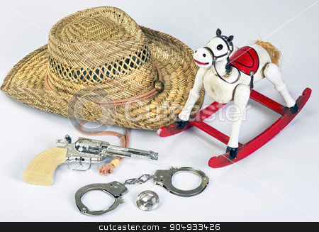 To use this stock image in your creative project, please select the size you need over to the right and click the "Add to Cart" button.
Your downloaded image will come with the Cutcaster watermark removed so don’t worry about the watermark you see on this page. Cowboys Toys. stock photo, Old vintage childhood western cowboy toys. by WScott