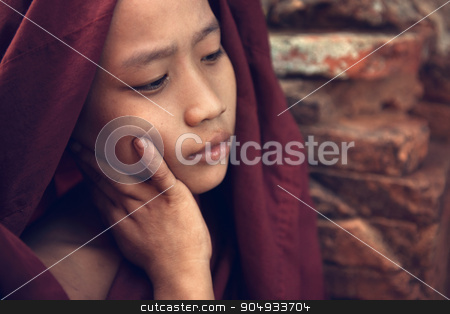 To use this stock image in your creative project, please select the size you need over to the right and click the "Add to Cart" button.
Your downloaded image will come with the Cutcaster watermark removed so don’t worry about the watermark you see on this page. Buddhist novice monk portrait stock photo, Portrait of young novice monk inside Buddhist temple, low light with noise setting, Bagan, Myanmar. by szefei