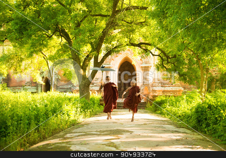 To use this stock image in your creative project, please select the size you need over to the right and click the "Add to Cart" button.
Your downloaded image will come with the Cutcaster watermark removed so don’t worry about the watermark you see on this page. Young Buddhist novice monks running stock photo, Two little Buddhist novice monks running outdoors under shade of green tree, outside monastery, Myanmar. by szefei