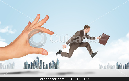 To use this stock image in your creative project, please select the size you need over to the right and click the "Add to Cart" button.
Your downloaded image will come with the Cutcaster watermark removed so don’t worry about the watermark you see on this page. Hand catching businessman running forward stock photo, Hand catching businessman running forward with cityscape background by cherezoff