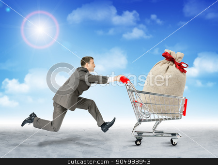 To use this stock image in your creative project, please select the size you need over to the right and click the "Add to Cart" button.
Your downloaded image will come with the Cutcaster watermark removed so don’t worry about the watermark you see on this page. Running businessman with bag in shopping cart stock photo, Running businessman with big bag in shopping cart by cherezoff
