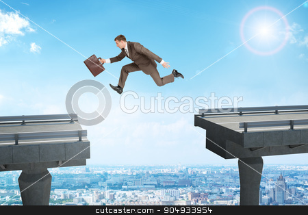 To use this stock image in your creative project, please select the size you need over to the right and click the "Add to Cart" button.
Your downloaded image will come with the Cutcaster watermark removed so don’t worry about the watermark you see on this page. Image of young businessman jumping over gap stock photo, Image of young businessman with suitcase jumping over gap by cherezoff