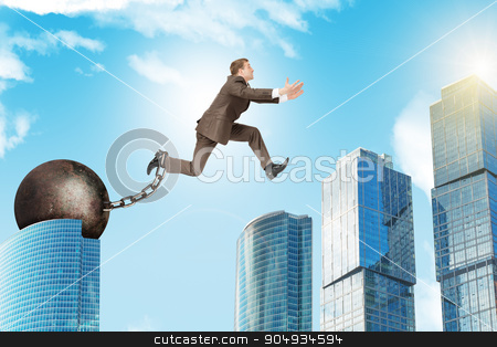 To use this stock image in your creative project, please select the size you need over to the right and click the "Add to Cart" button.
Your downloaded image will come with the Cutcaster watermark removed so don’t worry about the watermark you see on this page. Young man jumping over gap stock photo, Image of young businessman with iron ballast jumping over gap on city background by cherezoff