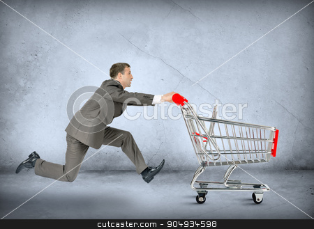 To use this stock image in your creative project, please select the size you need over to the right and click the "Add to Cart" button.
Your downloaded image will come with the Cutcaster watermark removed so don’t worry about the watermark you see on this page. Businessman pushing empty shopping cart stock photo, Businessman pushing shopping cart on grey wall background by cherezoff