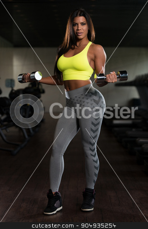 To use this stock image in your creative project, please select the size you need over to the right and click the "Add to Cart" button.
Your downloaded image will come with the Cutcaster watermark removed so don’t worry about the watermark you see on this page. Latino Woman Doing Exercise For Biceps stock photo, Sexy Latina Woman Working Out Biceps In Fitness Center - Dumbbell Concentration Curls by Jasminko Ibrakovic