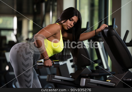 To use this stock image in your creative project, please select the size you need over to the right and click the "Add to Cart" button.
Your downloaded image will come with the Cutcaster watermark removed so don’t worry about the watermark you see on this page. Latino Woman Doing Exercise For Back stock photo, Sexy Mexican Woman Working Out Back With Dumbell In Fitness Center by Jasminko Ibrakovic