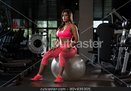 To use this stock image in your creative project, please select the size you need over to the right and click the "Add to Cart" button.
Your downloaded image will come with the Cutcaster watermark removed so don’t worry about the watermark you see on this page. Sexy Mexican Woman Resting In The Gym stock photo, Young Mexican Woman Resting On Ball After Working Out In Fitness Cente by Jasminko Ibrakovic