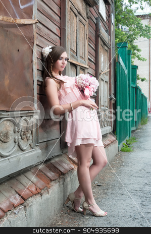 To use this stock image in your creative project, please select the size you need over to the right and click the "Add to Cart" button.
Your downloaded image will come with the Cutcaster watermark removed so don’t worry about the watermark you see on this page. beautiful woman with flower near old wooden house stock photo, Portrait of a beautiful brunette woman with peony flowers near old wooden abandoned house by Aikon