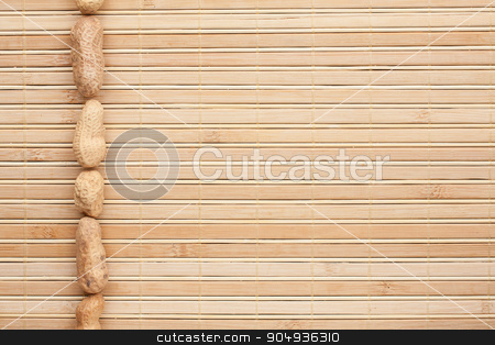 To use this stock image in your creative project, please select the size you need over to the right and click the "Add to Cart" button.
Your downloaded image will come with the Cutcaster watermark removed so don’t worry about the watermark you see on this page. Unrefined peanuts lying on a bamboo mat stock photo, Unrefined peanuts lying on a bamboo mat can be used as background by alekleks