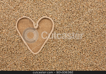 To use this stock image in your creative project, please select the size you need over to the right and click the "Add to Cart" button.
Your downloaded image will come with the Cutcaster watermark removed so don’t worry about the watermark you see on this page. The symbolic heart made of rope lies on sackcloth and rye grains stock photo, The symbolic heart made of rope lies on sackcloth and rye grains, with space for your text by alekleks