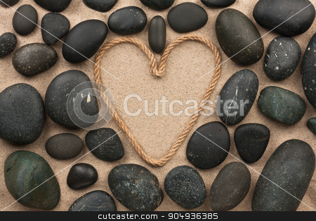 To use this stock image in your creative project, please select the size you need over to the right and click the "Add to Cart" button.
Your downloaded image will come with the Cutcaster watermark removed so don’t worry about the watermark you see on this page. Beautiful frame of rope in the form of heart with black stones stock photo, Beautiful frame of rope in the form of heart with black stones, on the sand by alekleks