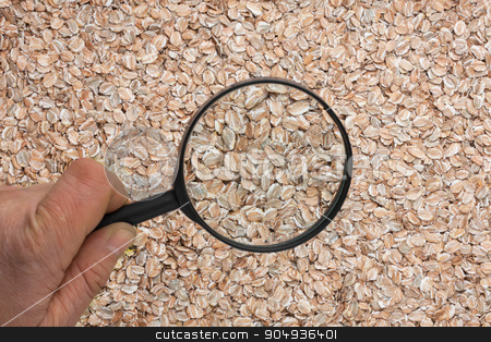 To use this stock image in your creative project, please select the size you need over to the right and click the "Add to Cart" button.
Your downloaded image will come with the Cutcaster watermark removed so don’t worry about the watermark you see on this page. Human hand holding a magnifying glass over the flakes stock photo, Human hand holding a magnifying glass over the flakes can be used as background by alekleks