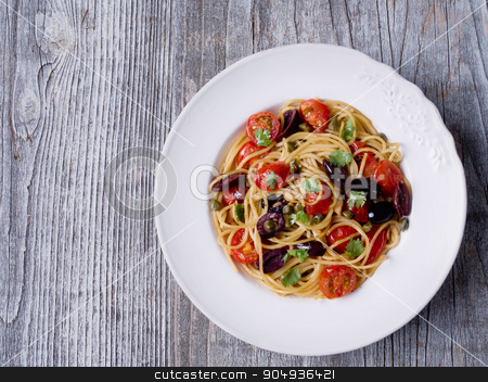 To use this stock image in your creative project, please select the size you need over to the right and click the "Add to Cart" button.
Your downloaded image will come with the Cutcaster watermark removed so don’t worry about the watermark you see on this page. rustic italian spaghetti puttanesca pasta stock photo, close up of rustic italian spaghetti puttanesca pasta by zkruger