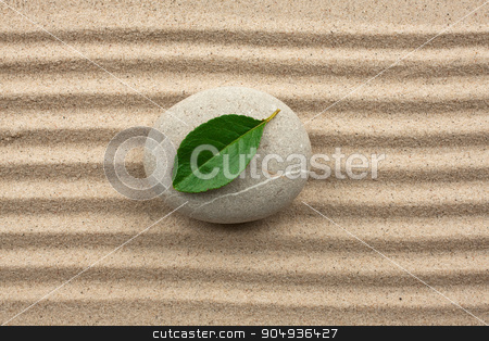 To use this stock image in your creative project, please select the size you need over to the right and click the "Add to Cart" button.
Your downloaded image will come with the Cutcaster watermark removed so don’t worry about the watermark you see on this page. Leaf on a rock in the sand stock photo, harmony concept with zen stones and leaves by alekleks