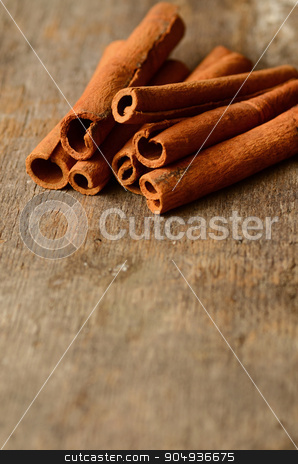 To use this stock image in your creative project, please select the size you need over to the right and click the "Add to Cart" button.
Your downloaded image will come with the Cutcaster watermark removed so don’t worry about the watermark you see on this page. Bunch of cinnamon sticks stock photo, Bunch of cinnamon sticks on a wooden background by sutike