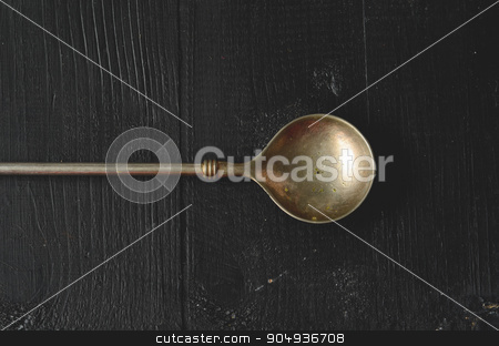 To use this stock image in your creative project, please select the size you need over to the right and click the "Add to Cart" button.
Your downloaded image will come with the Cutcaster watermark removed so don’t worry about the watermark you see on this page. Old metal spoon stock photo, Old metal spoon on dark background with copy space by sutike
