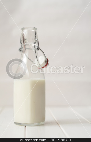 To use this stock image in your creative project, please select the size you need over to the right and click the "Add to Cart" button.
Your downloaded image will come with the Cutcaster watermark removed so don’t worry about the watermark you see on this page. Milk in a glass bottle stock photo, Milk in a glass bottle on white wooden background by sutike